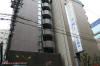 照照東橫INN旅館的招牌和大樓